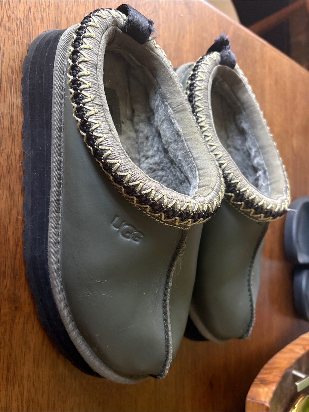 UGG women’s gray leather platform Slip-On